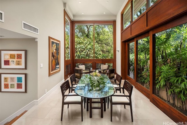 sunroom featuring visible vents