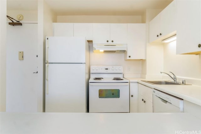 kitchen with white appliances, a sink, light countertops, white cabinets, and under cabinet range hood