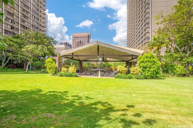 view of home's community featuring a gazebo, a yard, and a patio area