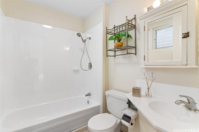 bathroom featuring vanity, toilet, and shower / bath combination