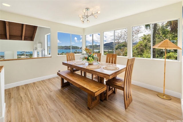 45-081 Lilipuna Rd Unit F, Kaneohe, HI 96744 - dining area featuring baseboards, plenty of natural light, and light wood-type flooring