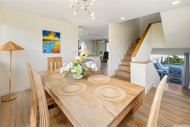 45-081 Lilipuna Rd Unit F, Kaneohe, HI 96744 - dining space featuring light wood-style flooring, stairs, a chandelier, recessed lighting, and baseboards
