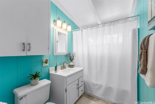 bathroom with toilet, vanity, and shower / bathtub combination with curtain