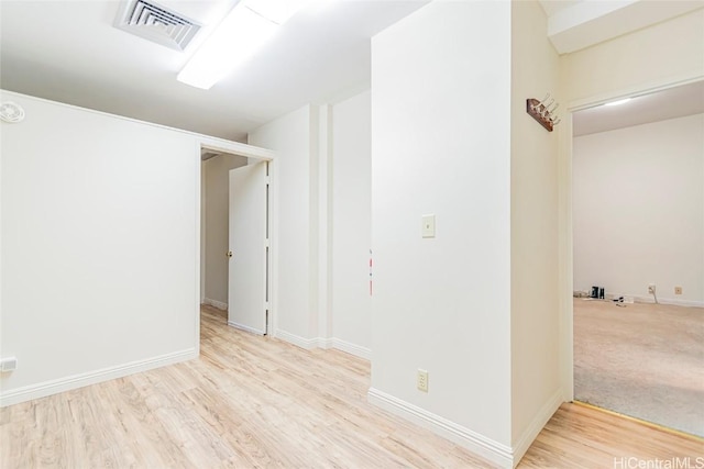 1088 Bishop St Unit 204, Honolulu, HI 96813 - unfurnished room with visible vents, baseboards, and wood finished floors