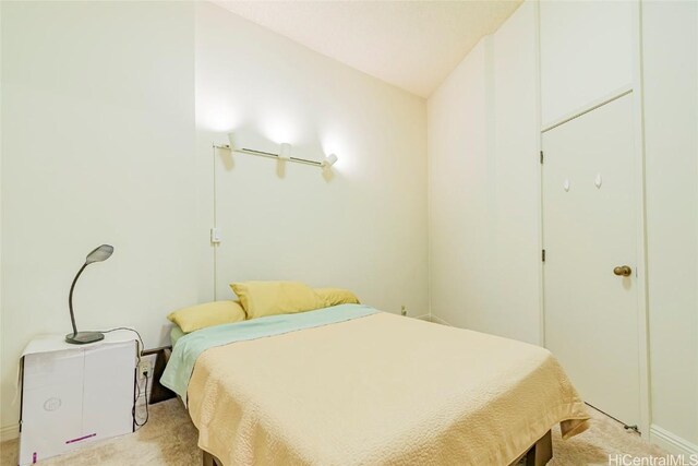 1088 Bishop St Unit 204, Honolulu, HI 96813 - bedroom with light colored carpet