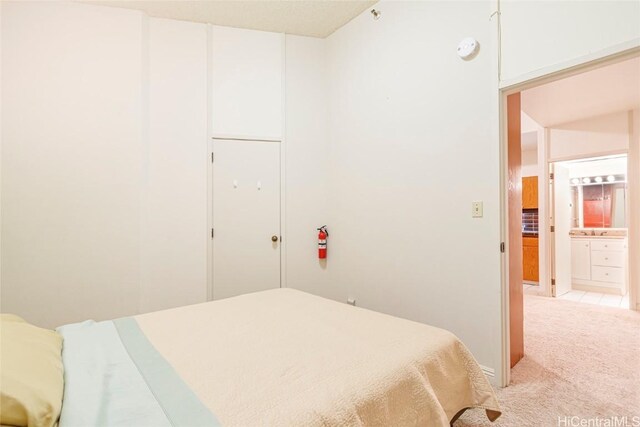 1088 Bishop St Unit 204, Honolulu, HI 96813 - bedroom with light colored carpet