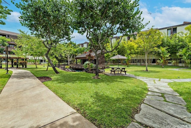 view of community with a gazebo and a lawn