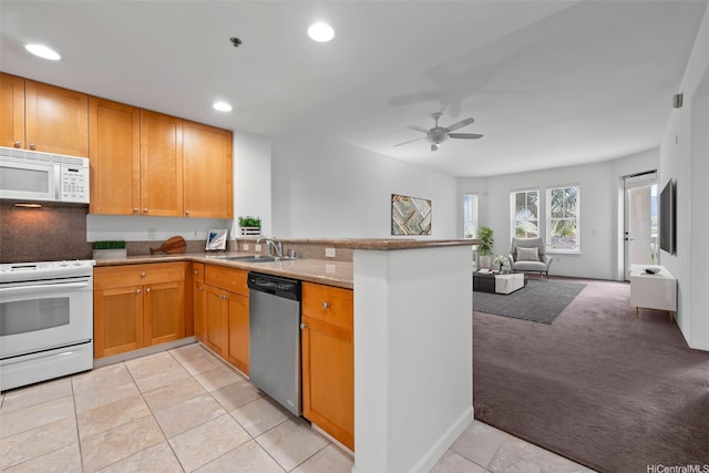 520 Lunalilo Home Rd Unit 8203, Honolulu, HI 96825 - kitchen featuring white appliances, a peninsula, light carpet, open floor plan, and a ceiling fan