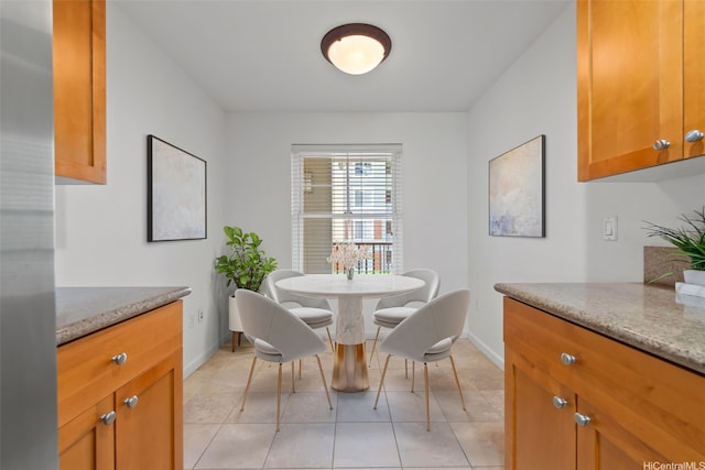 520 Lunalilo Home Rd Unit 8203, Honolulu, HI 96825 - dining room featuring baseboards and light tile patterned floors
