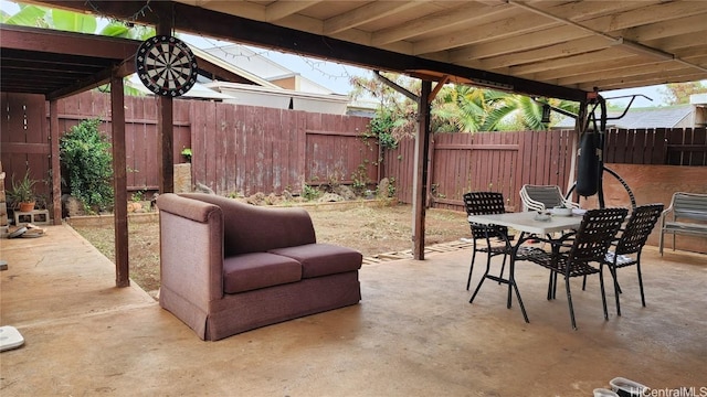 view of patio / terrace with outdoor dining area and a fenced backyard