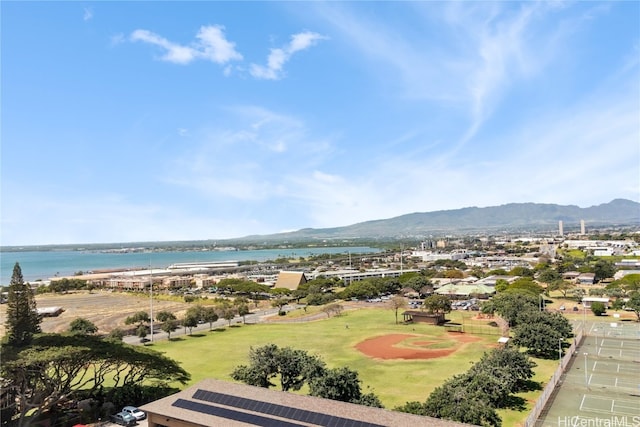 aerial view featuring a water and mountain view