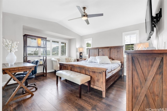 bedroom featuring vaulted ceiling, multiple windows, dark wood-style floors, and baseboards