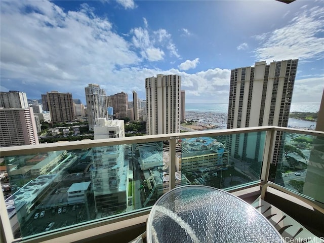 balcony featuring a city view