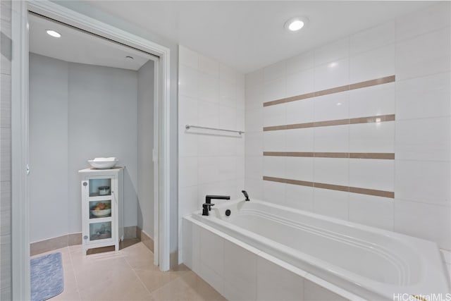 full bathroom with tile patterned flooring, recessed lighting, and a garden tub