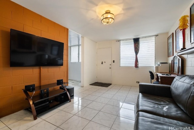 living area featuring light tile patterned floors