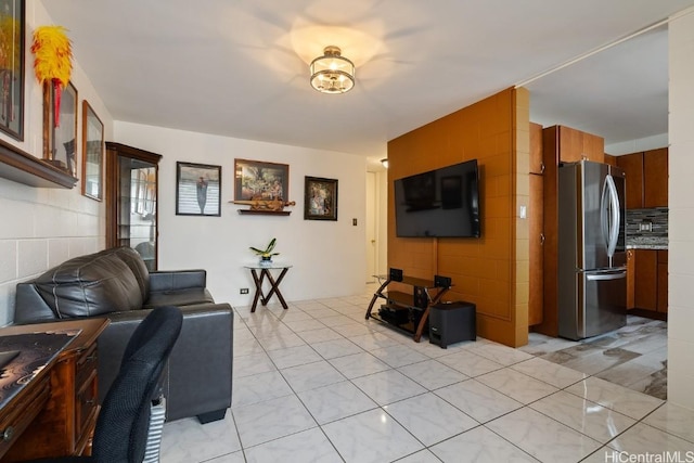 living room featuring light tile patterned flooring