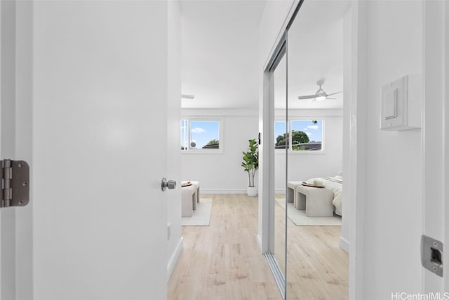 91-1046 Kauiki St, Ewa Beach, HI 96706 - bathroom with ceiling fan, baseboards, and wood finished floors