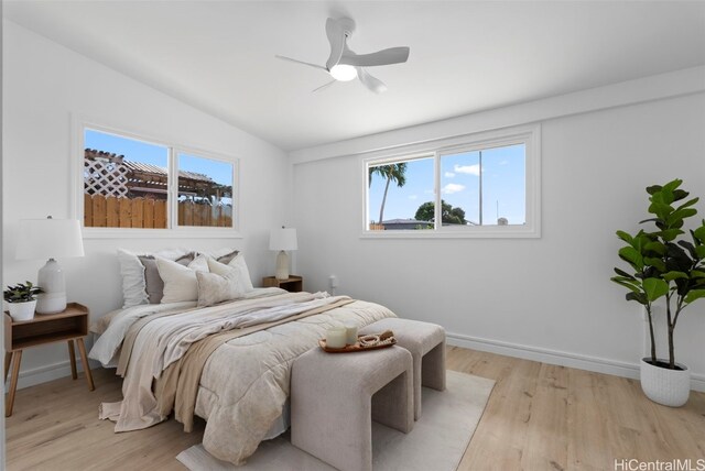 91-1046 Kauiki St, Ewa Beach, HI 96706 - bedroom featuring baseboards, light wood-style floors, ceiling fan, and vaulted ceiling