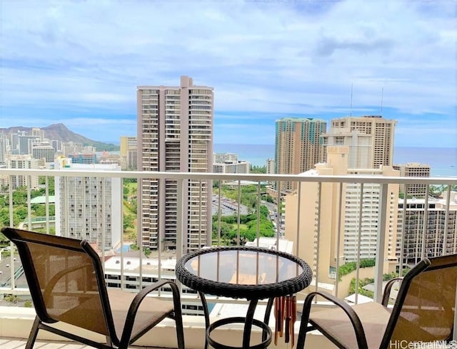 balcony featuring a city view