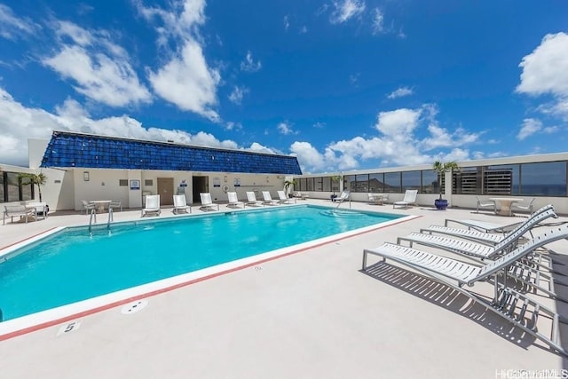 pool featuring a patio