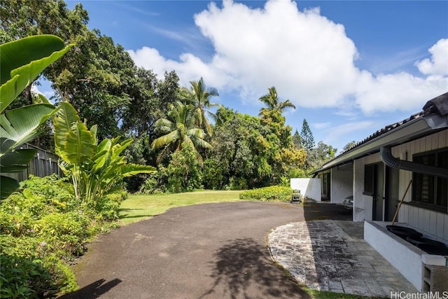 view of patio / terrace with driveway