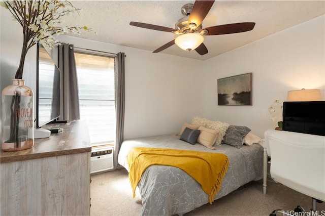 carpeted bedroom featuring a ceiling fan