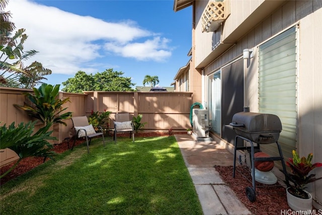 view of yard with a fenced backyard and a patio area