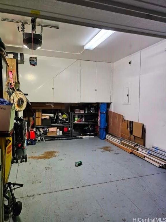 garage featuring a garage door opener