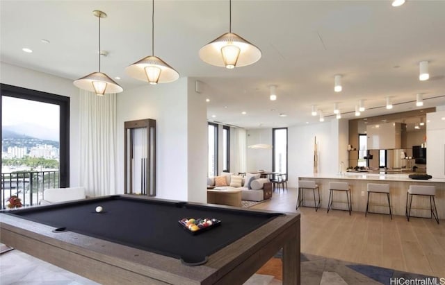 game room featuring recessed lighting, pool table, and light wood-style floors