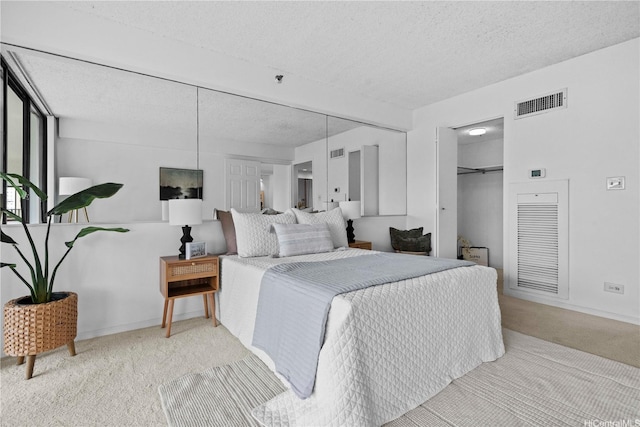 581 Kamoku St Unit 504, Honolulu, HI 96826 - carpeted bedroom with a textured ceiling and baseboards