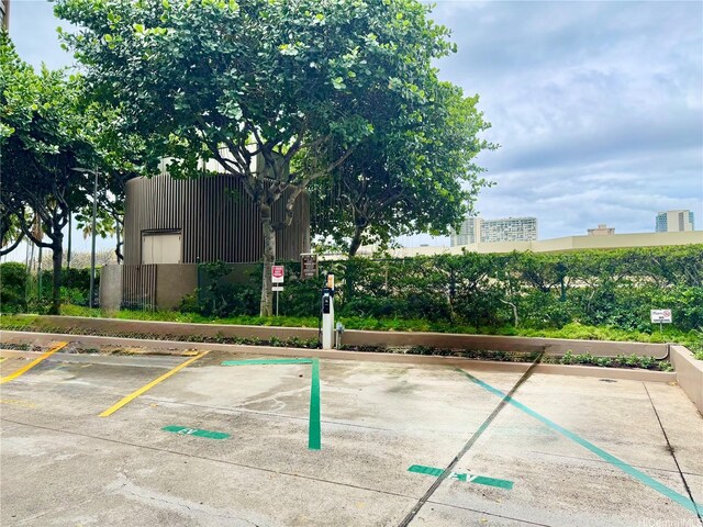 581 Kamoku St Unit 504, Honolulu, HI 96826 - view of uncovered parking lot