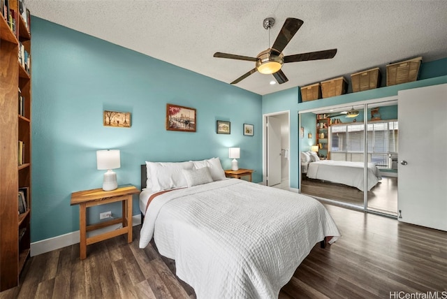 bedroom with a closet, a textured ceiling, ceiling fan, and wood finished floors