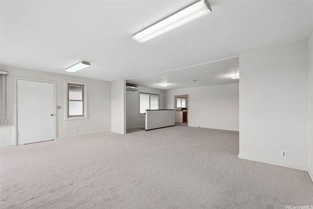 99-426 Poaha Pl, Aiea, HI 96701 - unfurnished living room featuring light carpet and plenty of natural light