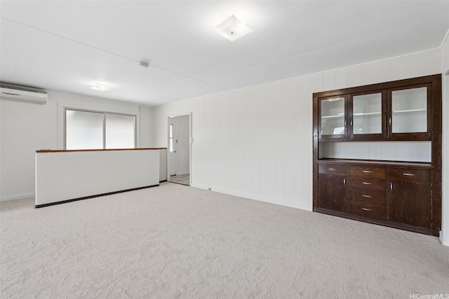 99-426 Poaha Pl, Aiea, HI 96701 - unfurnished room with a wall mounted AC and light colored carpet