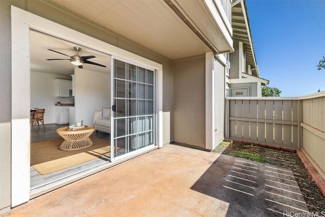 view of patio / terrace featuring fence