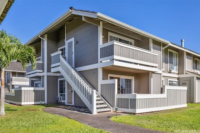 exterior space featuring stairs and cooling unit