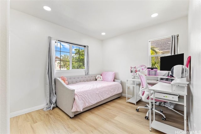 bedroom featuring recessed lighting, baseboards, and wood finished floors