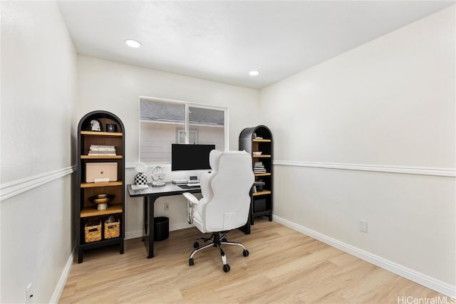 office area with recessed lighting, baseboards, and wood finished floors