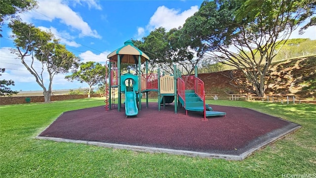 community play area featuring a yard