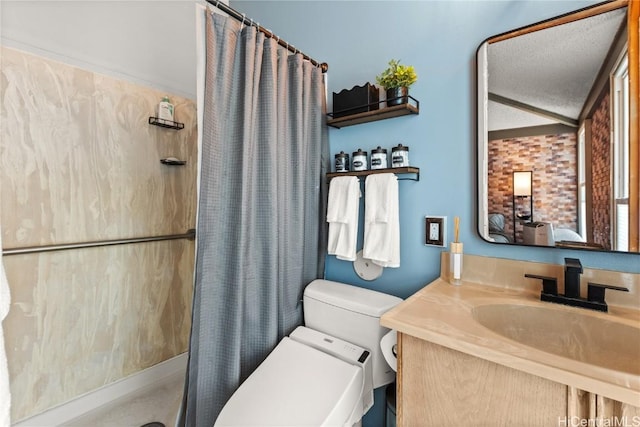 full bathroom featuring curtained shower, a textured ceiling, toilet, and vanity