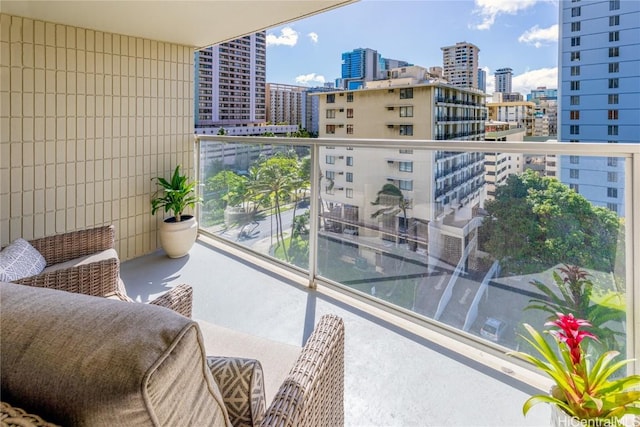 balcony featuring a city view