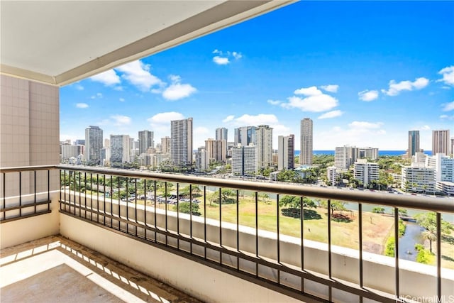 balcony featuring a city view