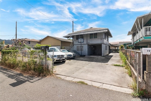 view of front of house with fence