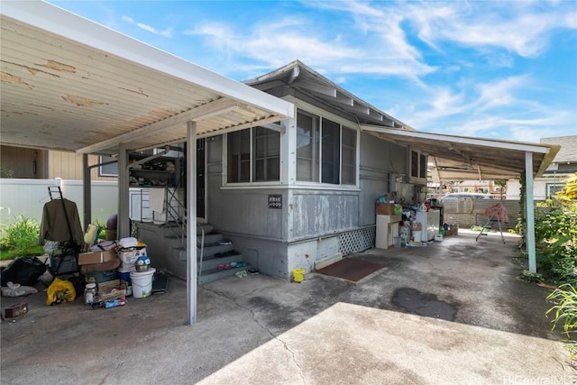 exterior space with crawl space and a carport