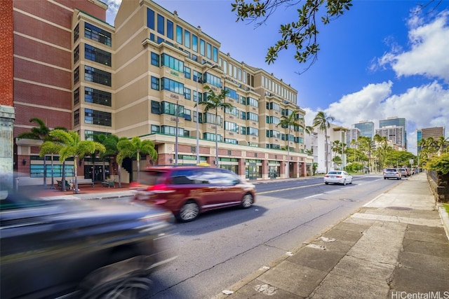 view of property with a city view