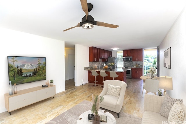 living room with ceiling fan