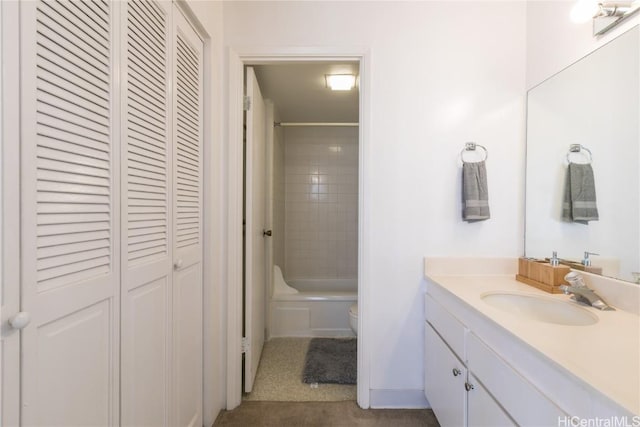 full bath with a closet, shower / bathtub combination with curtain, toilet, and vanity