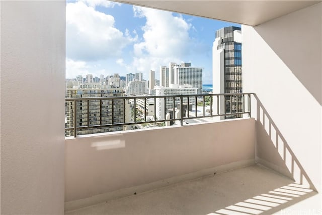 balcony featuring a view of city