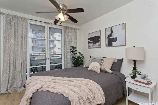 bedroom featuring ceiling fan and wood finished floors