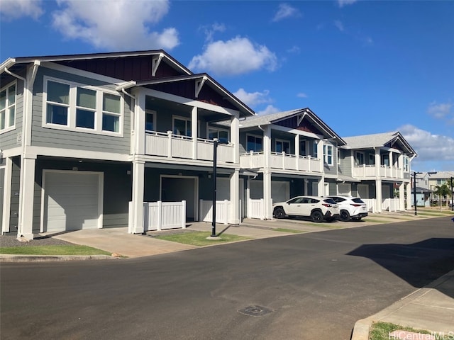 townhome / multi-family property featuring board and batten siding and an attached garage